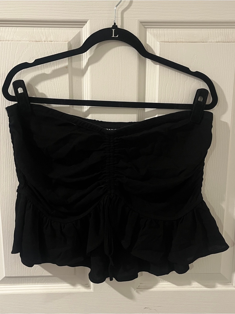 torrid Black Strapless Ruffle Peplum Camisole